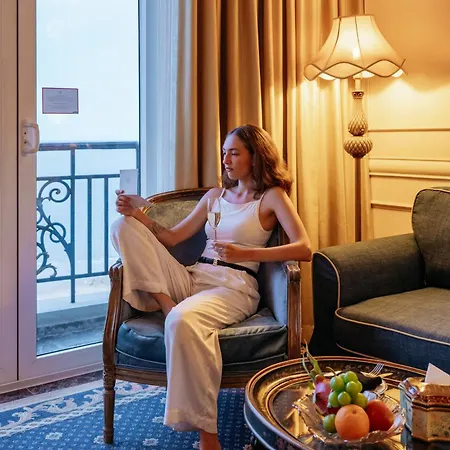 The Imperial Vung Tau Hotel Exterior photo A woman in a hotel room